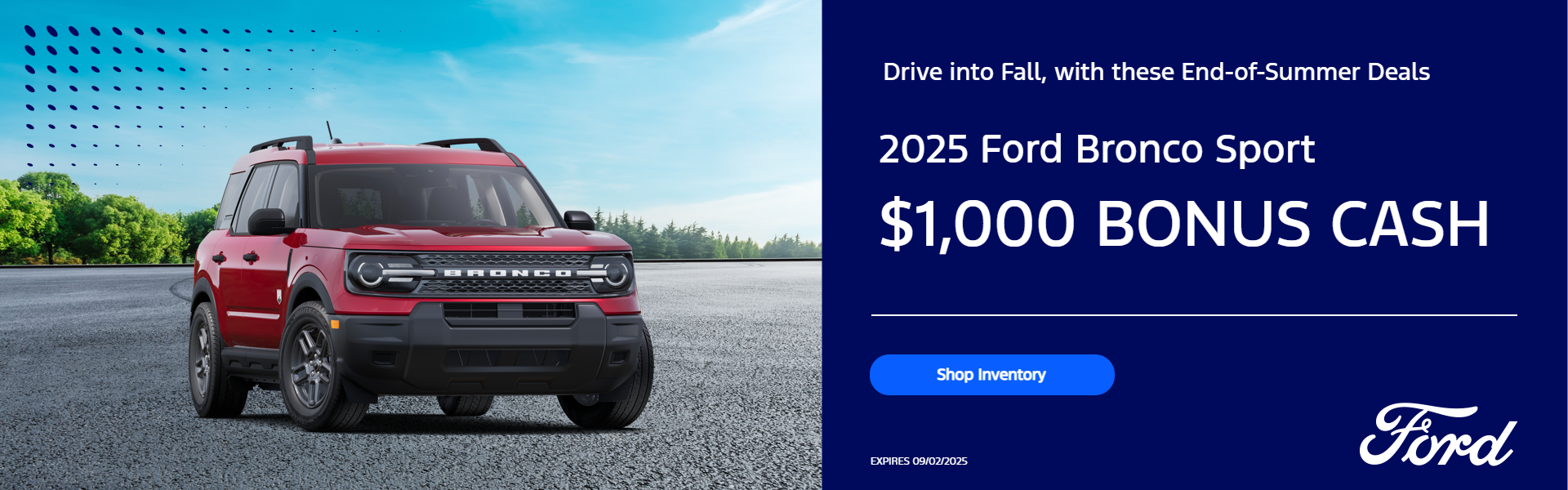 Red Bronco Sport on sunny background with trees